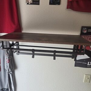 I have another shelf a little bit bigger with hooks